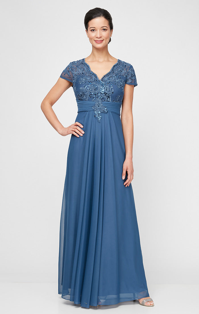 Plus Long Surplice Neckline A-Line Dress with Embroidered Pleated Waist and Scallop Detail