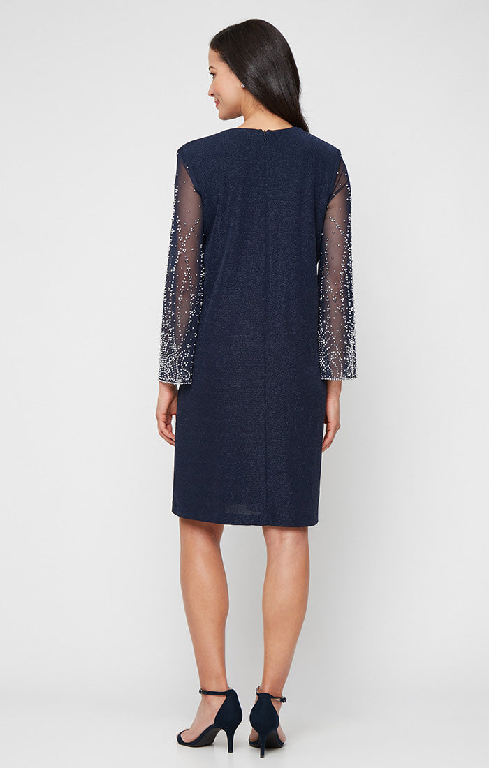 Short Metallic Knit Jacket Dress with Heat Set Illusion Sleeves and Elongated Jacket