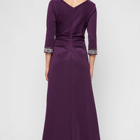Long Stretch Scuba Crepe Dress with Surplice Neckline, Embellished Sleeve Detail and Tulip Overlay Cascade Skirt