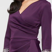 Long Stretch Scuba Crepe Dress with Surplice Neckline, Embellished Sleeve Detail and Tulip Overlay Cascade Skirt