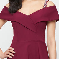 *Long Stretch Crepe Dress with Embellished Strap Cold Shoulder Detail and Cascade Peplum Hem Bodice